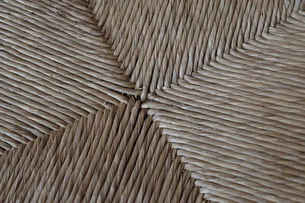 macro detail of a straw chair