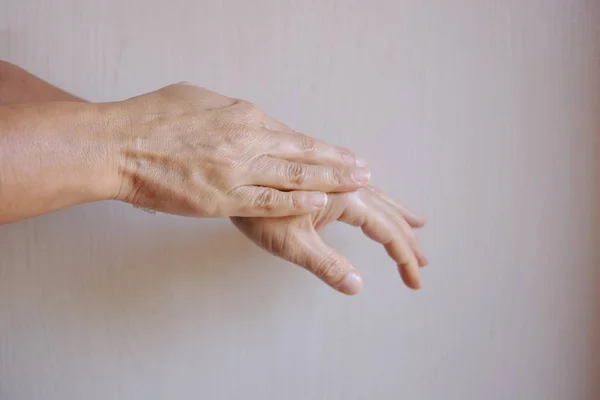 Woman Spreads Cream Her Hands — Stock Photo, Image