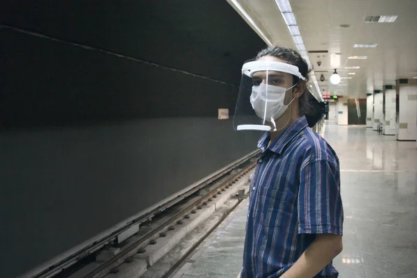 Isolated Long Haired Smart Young Man Wearing Face Shield Mask — Stock Photo, Image