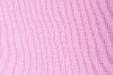 Yumuşak açık pembe kumaş tekstil arka planı rahat moda tasarımı ve şık dekoratif konsept için birbirine karışmış iplik dokusunu gösterir