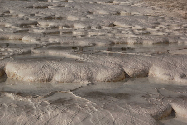 Salt texture in salt ponds. Salt structures.