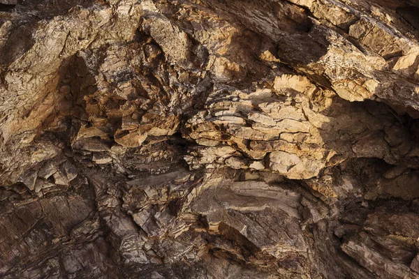 Pedra rochosa marrom, natureza, uso como fundo — Fotografia de Stock