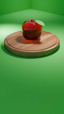 Dekoratif kırmızı cam bir elma yeşil bir stüdyo arka planına karşı tahta bir kesim tahtasının üzerinde oturur. Görüntü, parlak yansıtıcı dokuları ve koyu renkleriyle modern bir natürmort yaşam kavramını vurgular.
