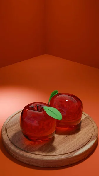 Kırmızı stüdyo arkaplanının önündeki tahta kesme tahtasına iki parlak kırmızı cam elma yerleştirilir. Resim, cesur yansıtıcı dokularla sanatsal hayatı temsil ediyor..