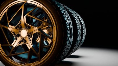 Üzerinde siyah araba lastikleri olan altın yıldız şekilli bir alaşım çemberi. Stüdyonun arka planında spot ışıklarıyla yerleştirilmiş ayrıntılı lastik izleri var..