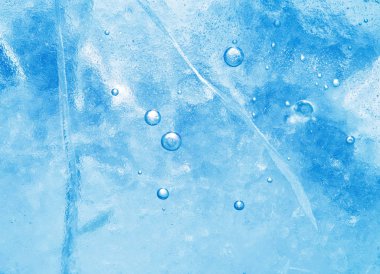 Soyut buz arkaplanı. Buz yüzeyinde çatlaklar olan mavi arkaplan