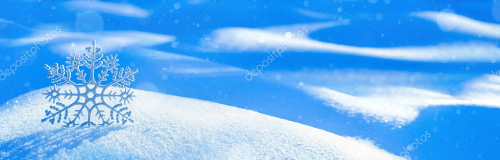 Christmas background with decorative snowflake on brilliant snow. Winter background.