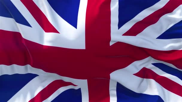 英国旗スローモーション古典的なフラグ滑らかな太陽 連続シームレス ループ背景を上昇風が強い日に風が吹いて — ストック動画