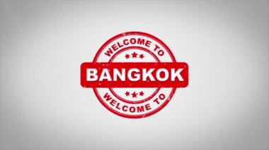 02. Hoşgeldiniz Bangkok damgalama metin ahşap damga animasyon imzaladı. Kırmızı mürekkep temiz beyaz kağıt yüzeyi zemin üzerine yeşil örtü arka plan dahil.