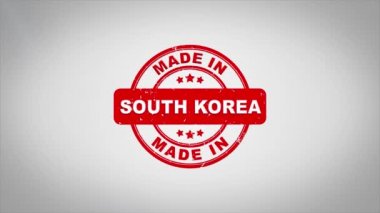 Güney Kore imzalı damgalama metin ahşap damga animasyon yapılmış. Kırmızı mürekkep temiz beyaz kağıt yüzeyi zemin üzerine yeşil örtü arka plan dahil.