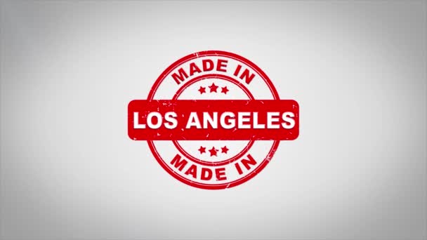 Gjort i Los Angeles undertecknat stämpling trä stämpel textanimering. — Stockvideo