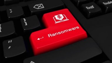 03. Ransomware yuvarlak hareket üstünde bilgisayar klavye düğme.
