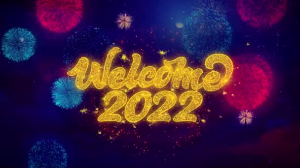 Welcome 2022 Greeting Text Sparkle Particles on Colored Fireworks — Stock Video