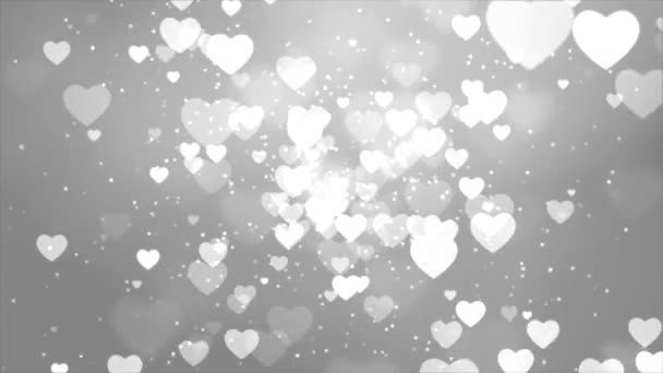 Résumé White Hearts Bokeh particule flottant sur fond noir Loop Animation. — Video