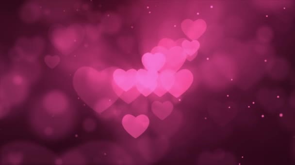 Pink Glitter Funkelndes magisches Licht. Shining Dust Heart Bokeh-Partikel Schleifenhintergrund 4K. — Stockvideo