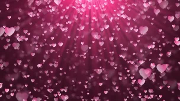 Рожеве серце літає і частинки потік світло романтичний петельний рух фон 4k — стокове відео