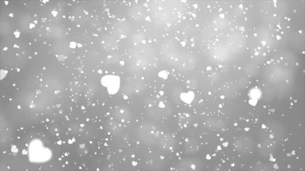 Beyaz aşk kalpleri bokeh ışıltılı parçacık hareket döngüsü arka planı — Stok video