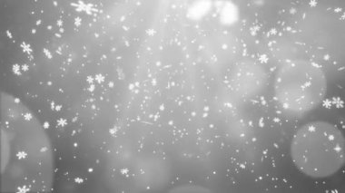 4k Beyaz konfeti kar taneleri ve mavi döngüde bokeh ışıkları Canlandırma