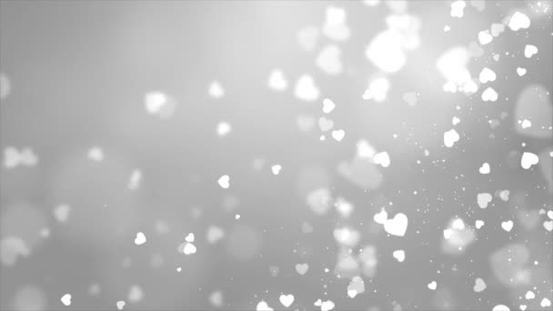 Bianco brillante cuori particelle bokeh astratto movimento 4K loop animazione sfondo. — Video Stock