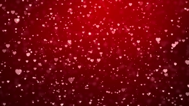 Burbujas rojas del corazón de San Valentín que fluyen oscuras sobre el fondo rosado del lazo 4K. — Vídeo de stock