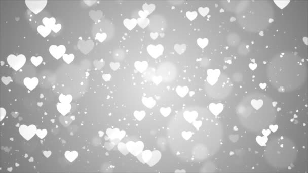 Fondos del corazón con corazones caídos partícula en bucle de luz para San Valentín, boda o amor — Vídeo de stock