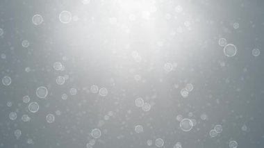 Uçan ve titreyen Toz Baloncukları 'nın soyut arkaplan canlandırması kar taneciklerini ışık boşluğu olarak algılar.