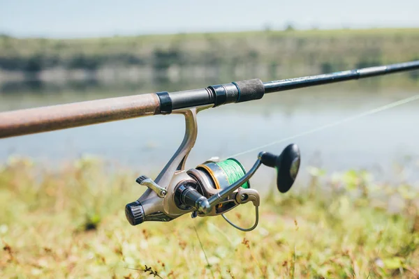 Fishing equipment rod wheel closeup outdoor nature