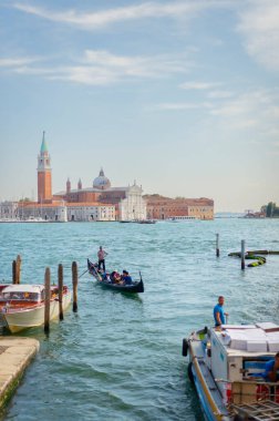 Venice, Italy - September 25, 2024. This photo of San Giorgio Maggiore Church was taken on a sunny and warm autumn day, the turquoise water gives the impression of freshness and coolness. 