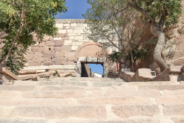 Arched gate entrance of Ankara Castle with stone steps and ramparts, showing defensive architecture. Fits travel, history, and heritage topics. Ankara, Turkey  29 August 2025. Editorial use only non-commercial