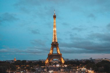Eiffel Tower at Night in Paris, France  Iconic Landmark Illuminated Against the City Skyline