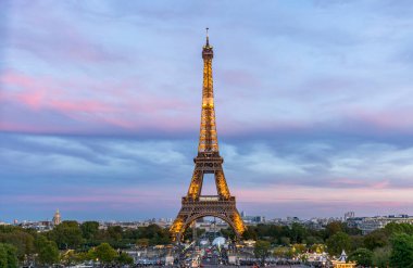 Eiffel Tower at Night in Paris, France  Iconic Landmark Illuminated Against the City Skyline