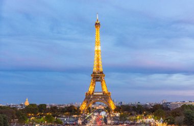 Eiffel Tower at Night in Paris, France  Iconic Landmark Illuminated Against the City Skyline