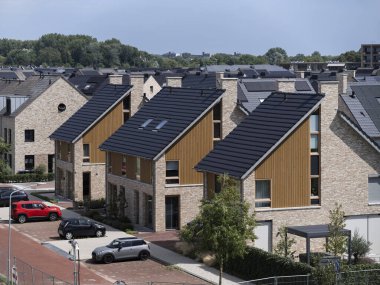 Contemporary residential development with solar panels and modern architectural design