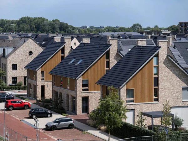 Contemporary residential development with solar panels and modern architectural design