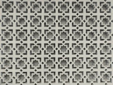 Bir binada beton üzerine İslami tasarım. Beyaz Mimaride Karmaşık Geometrik Desenler