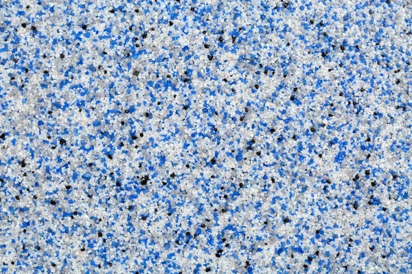 Ozdobny piasek kwarcowy powłoki epoksydowe podłogi lub ściany z niebieski, szary, biały i czarny kolorowe cząstki z bliska — Zdjęcie stockowe