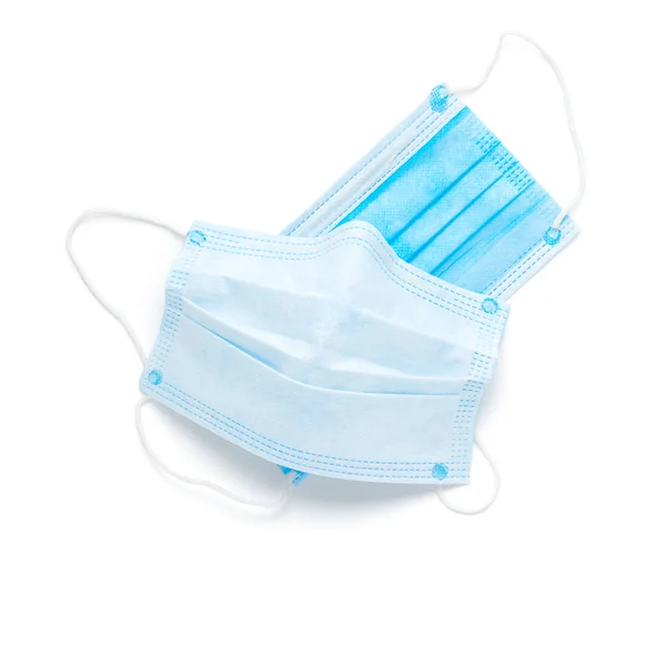 白い背景に隔離された青い医療用マスクトップビュー — ストック写真