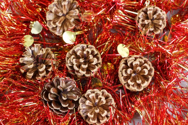 Pine Cones Red Tinsel Decoration Christmas — Stock Photo, Image