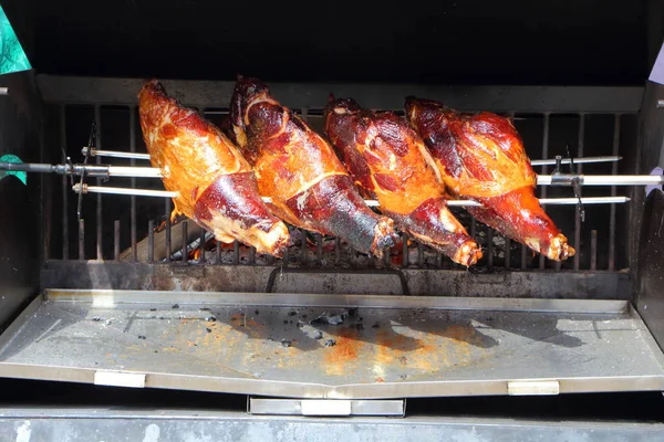 Ham roasted on a spit — Stock Photo, Image
