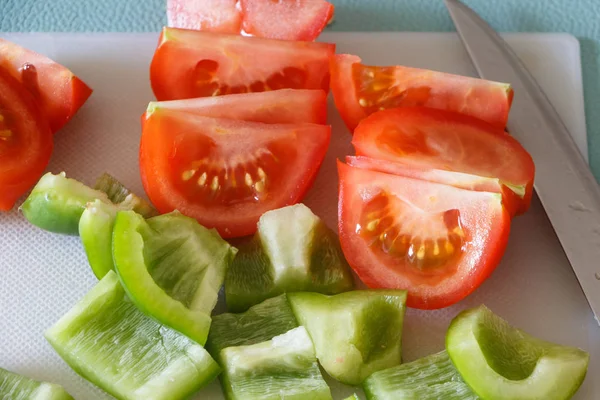 Pedaços de tomate e pimenta — Fotografia de Stock