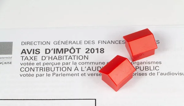 Housing tax written in french language and small houses