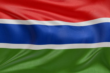 Dokulu kumaşla Gambiya bayrağı sallamak, nazikçe dalgalanmak ve katlanmak, pürüzsüz, dinamik hareket ve zarif tekstil detaylarıyla özgürlüğün ve kimliğin özünü yakalamak..