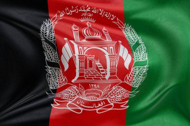 Yumuşak, dinamik hareket ve zarif tekstil detaylarıyla özgürlük ve kimliğin özünü yakalayan dokulu kumaşla Afganistan 'ın bayrağını sallamak..