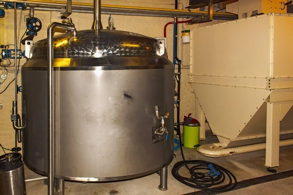 Equipment on a small brewery for beer production.