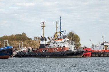 BALTIYSK, RUSSIA  - NOVEMBER 04, 2018: Russian port off-shore diesel tugboat Tornado. The tug is intended for craning operations in ports, participation in fire fighting operations and other.