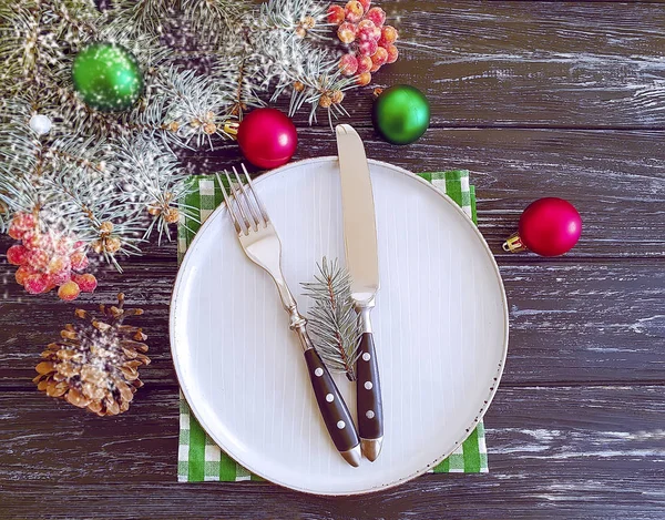 Christmas Tree Branch Plate Fork Knife Wooden Background — Stock Photo, Image