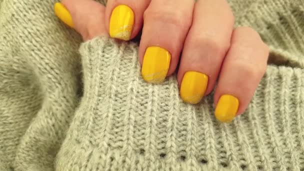 Female Hand Yellow Manicure Sweater — Stock Video