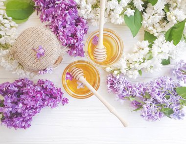 fresh honey lilac flower on wooden background