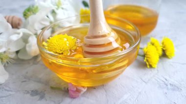 fresh honey flowering cherry dandelion slow motion