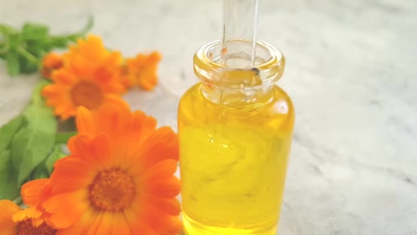 Cosmetic Oil Flower Calendula Slow Motion — Stock Video